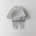 Ensemble sweat et pantalon tricoté