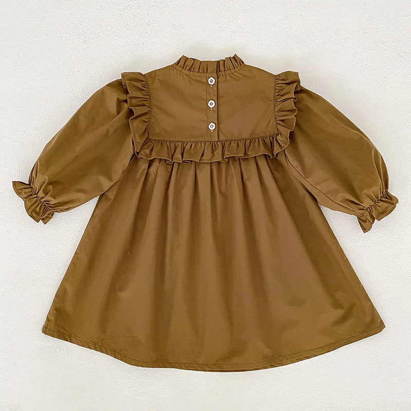 Robe brodée à col volanté